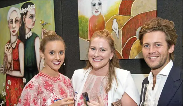  ??  ?? PRESTIGE: Enjoying the Toowoomba Grammar School Art Show are (from left) Mary Grant, Sarah-Jane MacDonald and James Cook. PHOTOS: NEV MADSEN