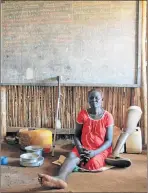  ?? Picture: REUTERS ?? ESCAPING WAR: Nyayath Uluak in a camp for civilians in Juba. Next to her is the prosthetic leg she has used since she was hit by a bullet