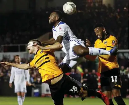  ?? REUTERS PIC ?? Leicester City’s Wes Morgan (centre) in action with Newport County’s Jamille Matt (right) and Mickey Demetriou during their FA Cup third round match on Jan 6. Newport won 2-1.