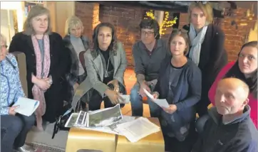  ?? ?? The Yalding Residents for Sensible Developmen­t Group examine the plans with Helen Grant MP. From Left, Elke Day, Lisa Brooks, Jenny Scott, Helen Grant, John Ackerman, Bethan Godden, Meg West, Susie Welland and Stephen Day