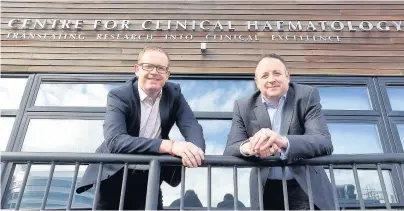  ??  ?? >
Cure Leukaemia chief executive James McLaughlin (left) and Simon Wills, lead architect with PHD Architects, outside the Centre for Clinical Haematolog­y at the Queen Elizabeth Hospital Birmingham