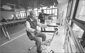  ?? XU YU / XINHUA ?? Bottom: Elderly Chinese use fitness equipment to exercise at a home care service center in Fuyang district, Hangzhou, Zhejiang province in October 2023. Fuyang has been building gyms and other facilities within a walking distance of 15 minutes from their homes.