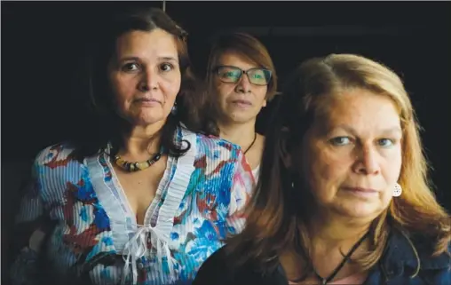  ?? (AP/Natacha Pisarenko) ?? Lucia Gimenez (from left), Alicia Torancio and Beatriz Delgado, former Opus Dei domestic workers, pose for a photo Oct. 21 in Buenos Aires, Argentina.