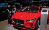  ??  ?? Jaguar Land Rover showcases its electric sport-utility vehicle called I-PACE.