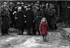  ??  ?? Girl in the red coat … Oliwia Dabrowska in the 1993 film Schindler’s List. Photograph: Cinetext Bildarchiv/Allstar/Universal