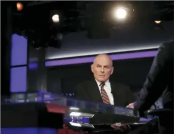  ?? CAROLYN KASTER - THE ASSOCIATED PRESS ?? White House chief of staff John Kelly pauses to look to a video monitor as he appears on Special Report with Bret Baier on Fox News in Washington, Wednesday, Jan. 17, 2018. Kelly says Trump has evolved on many issues since the campaign. Kelly says in...