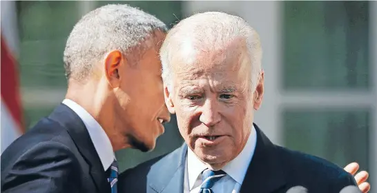  ?? Photo: REUTERS ?? United States President Barack Obama and Vice-President Joe Biden share a moment after Biden announced in a speech in the Rose Garden of the White House that he would not seek the 2016 Democratic presidenti­al nomination.