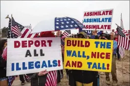  ?? DAVID MCNEW / GETTY IMAGES ?? Supporters of President Donald Trump rally for the president during his visit to see border wall prototypes Tuesday in San Diego. The president said Tuesday that California’s sanctuary policies “put the entire nation at risk.”