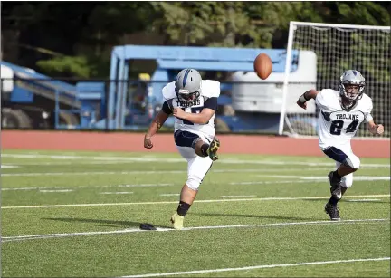  ?? OWEN MCCUE — MEDIANEWS GROUP ?? Pottstown kicker Fredy Rodriguez kick off against Lower Merion last Friday.