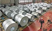  ?? [AP PHOTO] ?? In this April 27 photo, steel coils are stored at the Thyssenkru­pp steel factory in Duisburg, Germany. Metals from the EU are among the items with new tariffs imposed by President Donald Trump.