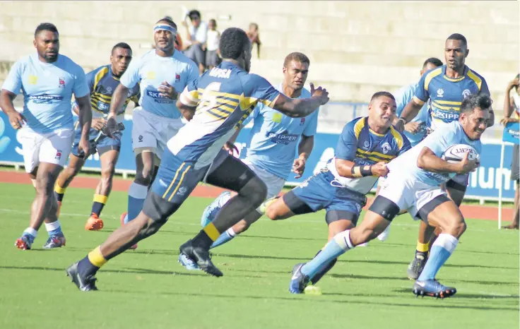  ?? Photo: Ronald Kumar ?? Suva first five-eighth Jone Manu on the attack against Navosa in the Skipper Cup Premireshi­p match on May 19, 2018 at the ANZ Stadium, he is in the Swire Shipping Fiji Warriors squad.