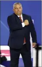  ?? L.M. OTERO THE ASSOCIATED PRESS ?? Hungarian Prime Minister Viktor Orban gestures with his fist on his chest after speaking at the Conservati­ve Political Action Conference in Dallas on Thursday.