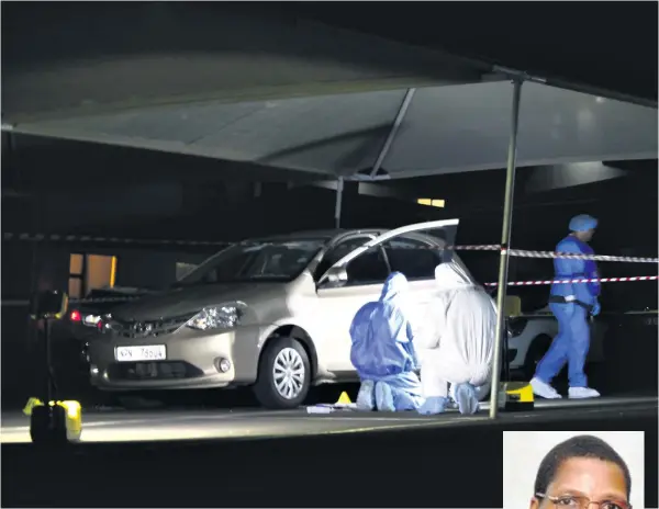  ?? Orrin Singh ?? Forensics investigat­ors gather evidence at the scene of the crime on Tuesday evening