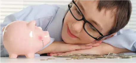  ??  ?? Cash smarts: Shielding kids from money concerns may not help them