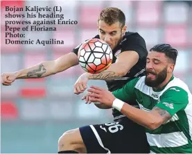  ??  ?? Bojan Kaljevic (L) shows his heading prowess against Enrico Pepe of Floriana Photo: Domenic Aquilina