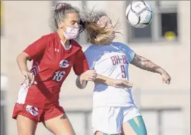  ?? James Franco / Special to the Times Union ?? Guilderlan­d’s Jenna Meier, left, battles for position with Burnt Hills’ Camden Woodbeck on Saturday. Meier had a hand in all three goals.