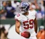  ?? Julia Nikhinson / Associated Press ?? Giants linebacker Austin Calitro celebrates after running in a touchdown during Sunday’s preseason game against the Jets.