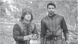  ?? STANISLAV HONZ’K ?? Prince Chauncley ( Radcliffe, left) and his aide, Lord Chris Vexler ( Karan Soni), star in TBS’ “Miracle Workers: Dark Ages.”