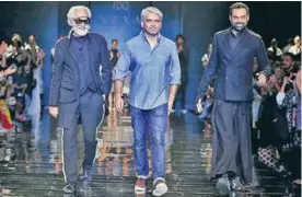  ??  ?? (L to R) FDCI president Sunil Sethi, designer Rajesh Pratap Singh and actor Abhay Deol on the runway during the show