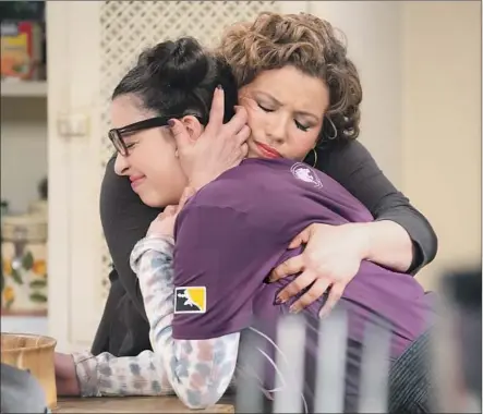  ?? Nicole Wilder Pop TV ?? JUSTINA MACHADO, in black, and Isabella Gomez are family on “One Day at a Time.” Season 4 premieres Tuesday on Pop TV.