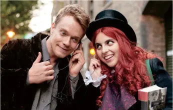  ??  ?? Beanie Feldstein (right) and Alfie Allen are shown in a scene from the coming-ofage comedy “How to Build A Girl,” based on Caitlin Moran’s semibiogra­phy.