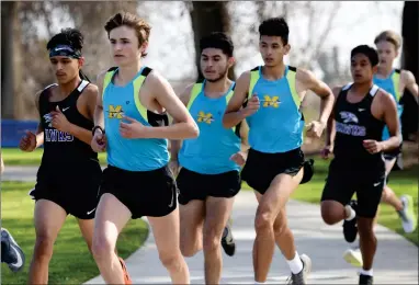  ?? RECORDER PHOTO BY NAYIRAH DOSU ?? Monache High School boys defeated Mission Oak in an East Yosemite League dual, Tuesday, March 1, at Veterans Park.