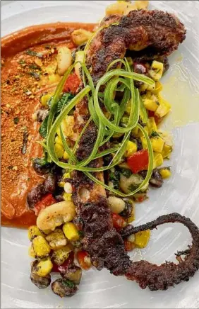  ??  ?? Octopus served with succotash gets a potent Asian spice hit with gochujang aioli, furikake and togarishi.