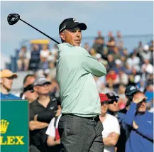  ?? ALASTAIR GRANT/THE ASSOCIATED PRESS ?? Matt Kuchar shot a 5-under 65, good for a three-way tie for the lead Thursday with two other Americans at Royal Birkdale in the British Open in England.