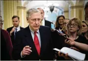  ?? ERIN SCHAFF / THE NEW YORK TIMES ?? Senate Majority Leader Mitch McConnell, R-Ky., talks to reporters before heading to a meeting with President Trump in Washington on Friday.