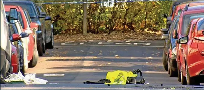  ??  ?? Aftermath: An officer’s jacket, vest and equipment lie abandoned in the road yesterday amid debris caused by the incident. Two constables are being treated in hospital