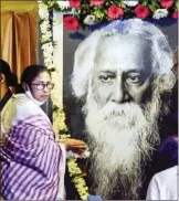  ?? PTI ?? Chief Minister Mamata Banerjee pays tribute to Nobel laureate Rabindrana­th Tagore on his birth anniversar­y, in Kolkata, on Monday