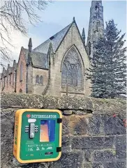  ?? ?? Life-saving equipment The new defibrilla­tor was installed outside Blantyre Old Parish Church