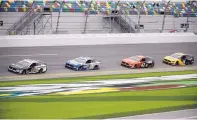  ?? TERRY RENNA/ASSOCIATED PRESS ?? In this Sept. 3, 2017, file photo, Kevin Harvick (4) leads the field past the green flag at the start of a NASCAR Monster Cup auto race at Darlington Raceway in Darlington, S.C.