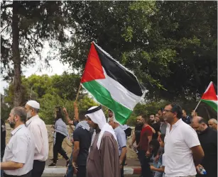  ?? (Ammar Awad/Reuters) ?? ISRAELI ARABS protest against the Nation-State Law, in the North last week.