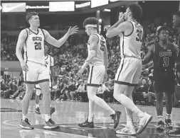  ?? PATRICK BREEN/THE REPUBLIC ?? GCU forward Noah Baumann (20) and Gabe McGlothan (30) are on the court against CBU at Grand Canyon University last December.