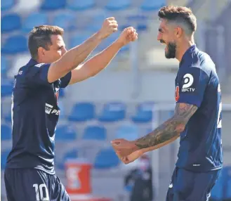  ?? / PHOTOSPORT ?? Montillo y Larrivey no estarán ante Palestino. Habrá que ver si juegan en el Monumental.