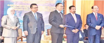  ??  ?? Dr Justin (centre) receiving the YPASM Research Grant presented by Sultan Mizan Zainal Abidin ibni Almarhum Sultan Mahmud AlMuktafi Billah Shah (second right) in October 2017 in Terengganu.