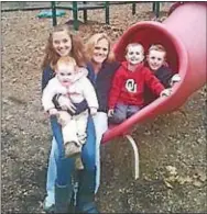  ?? SUBMITTED PHOTO ?? Kimberly Hvizda, center, with her four children.