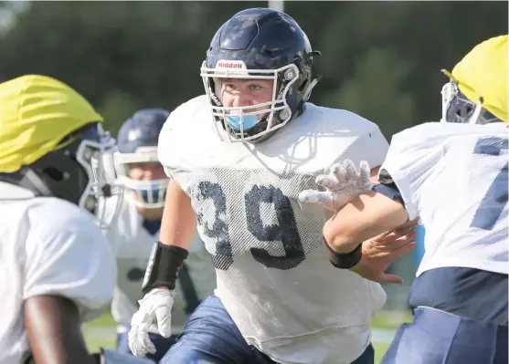  ?? ALLEN CUNNINGHAM/SUN-TIMES ?? Nazareth defensive end Ryan Keeler announced this week that he’s headed to Rutgers in 2021. With no football this fall, he’s working to graduate early.