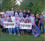  ?? SUBMITTED PHOTO — BERKSHIRE HATHAWAY ?? Members of Berkshire Hathaway’s Blue Bell office volunteer at Silver Springs Martin Luther School in Plymouth Meeting.