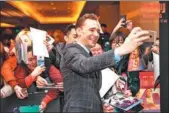  ??  ?? Hiddleston meets fans in Beijing to promote the upcoming fantasy adventure.