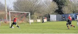  ??  ?? Andy Williams scores for Bro Goronwy. Pic: Paul Scholes