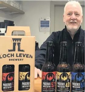  ??  ?? Cheers Brewery boss Thomas Moffat with the Phoenix label ale