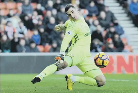  ?? Picture: Frank Reid ?? Vito Mannone saves with his right foot from Marko Arnautovic only to be beaten seconds later by the Austrian’s follow up effort.