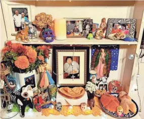  ?? ERICKA GARDUÑO VELÁZQUEZ ?? A Day of the Dead (Día de los Muertos) altar with offerings at Ericka Garduño Velázquez’s home.