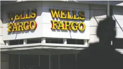  ?? PATRICK T. FALLON / BLOOMBERG FILES ?? Already having a bad year because of scandals, Wells Fargo is now suffering because of the pandemic and expects to have to set aside more money for bad loans.