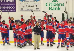  ?? File photo ?? Dave Belisle (center) is coaching a young Mount St. Charles team this season. The Mounties are 1-1 after a loss to Smithfield and a win over La Salle.