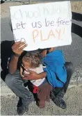  ??  ?? Members of the Cape Flats Concerned Residents protest against gang violence and crime in their community