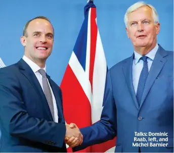  ??  ?? Talks: Dominic Raab, left, and Michel Barnier