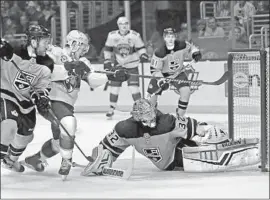  ?? Marcio Jose Sanchez Associated Press ?? A SHOT by Florida’s Jonathan Huberdeau gets past Kings goalie Jonathan Quick, breaking a 3-3 tie with 1:36 remaining in the third period Saturday.